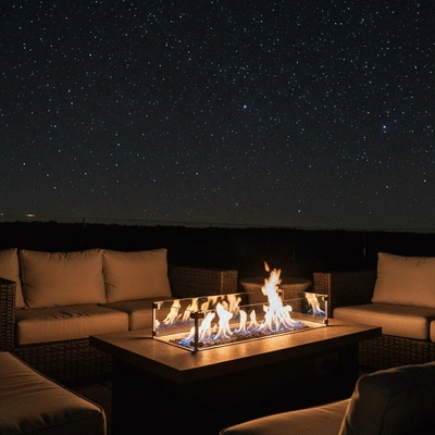 Cozy outdoor setup with gas fire pit at night